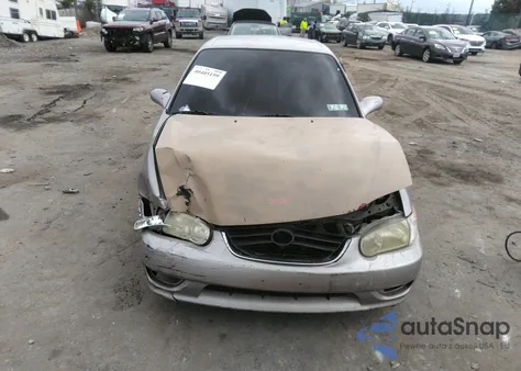 2001 Toyota Corolla Le from USA, damaged, VIN 2T1BR12EX1C439680